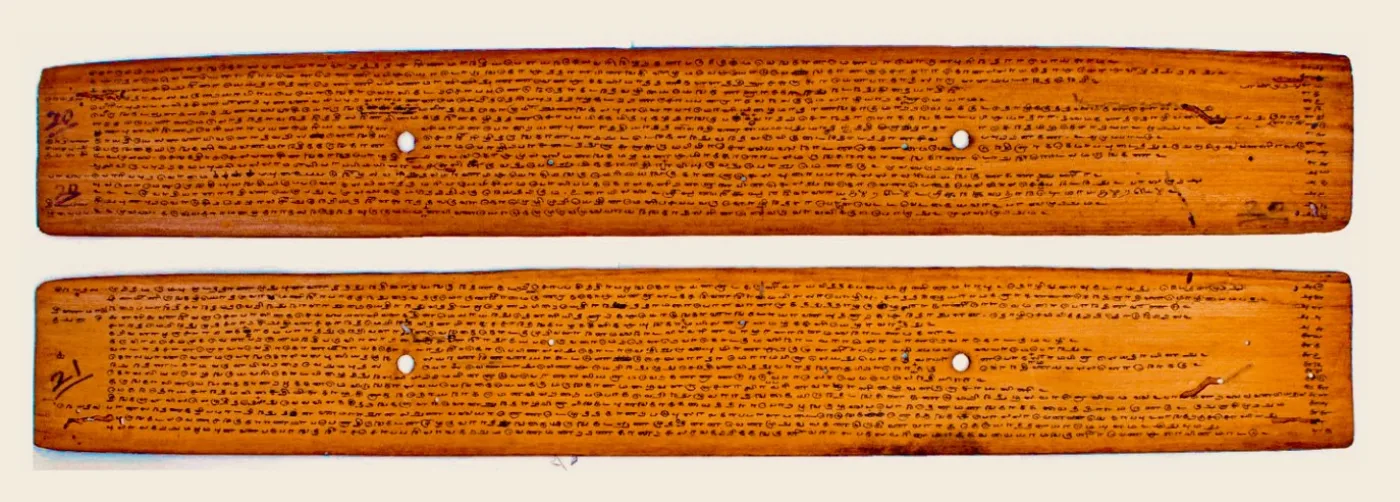 A real Tamil palm-leaf manuscript with long inscribed leaves
